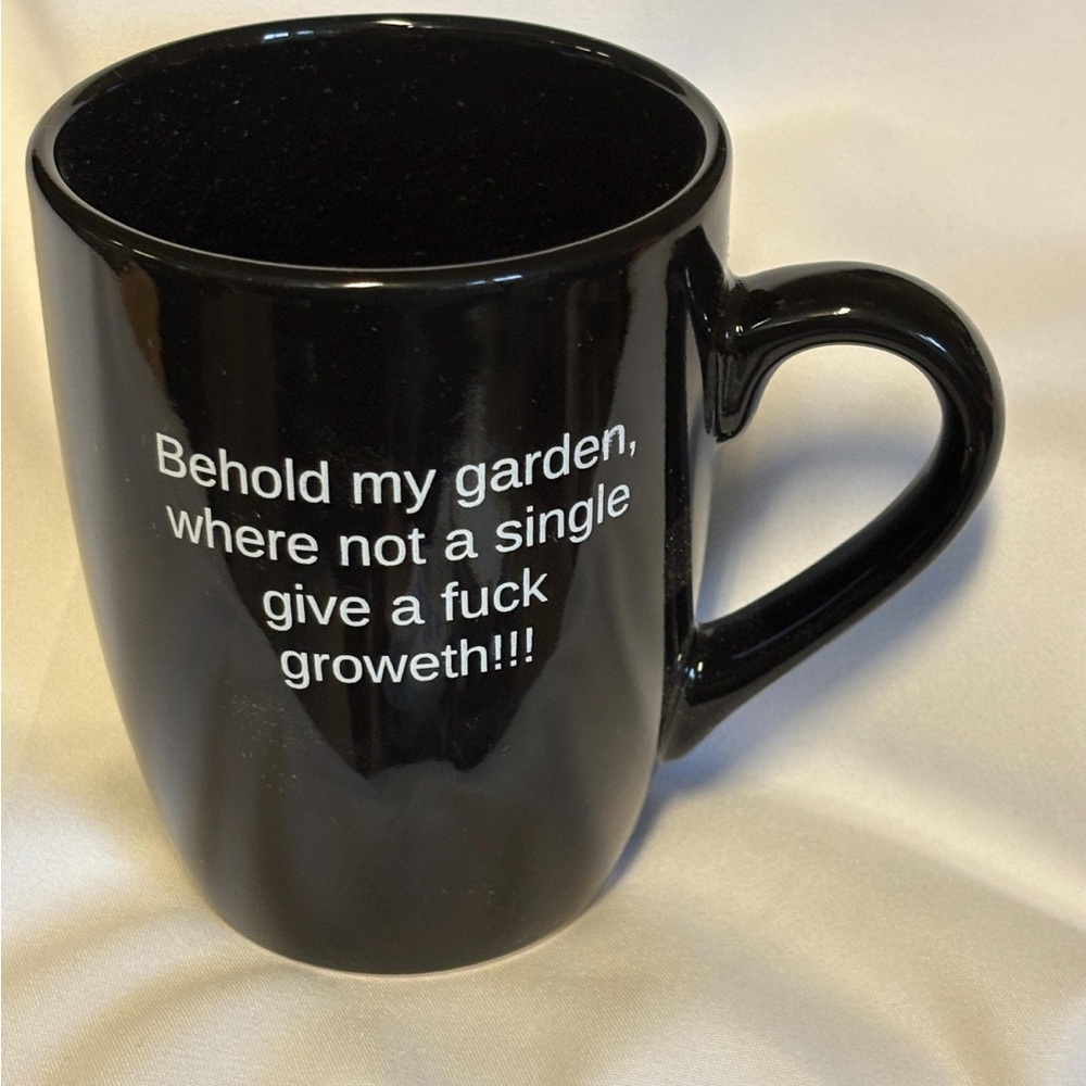 Sleek Black Mug with Witty Garden Quote